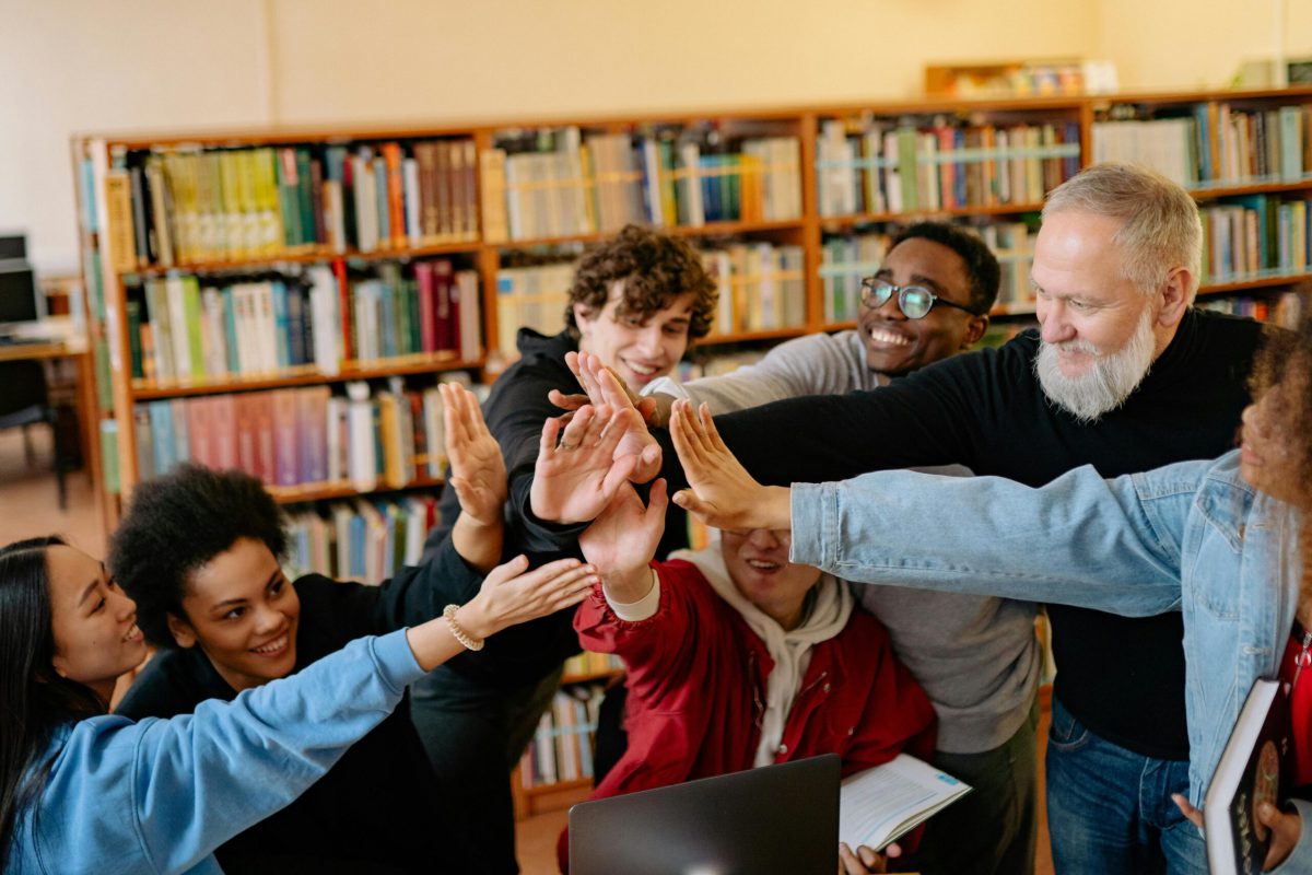 Photo by Yan Krukau: https://www.pexels.com/photo/group-of-students-and-bearded-man-giving-high-five-8199707/